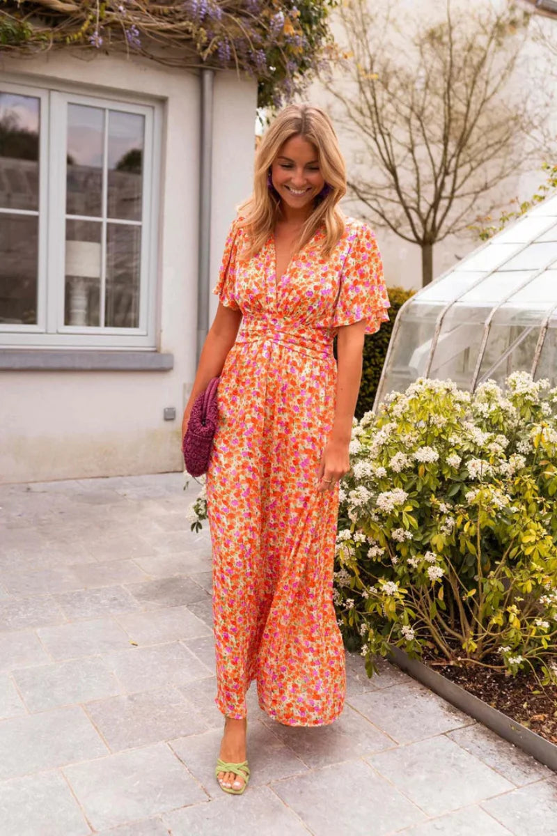 KYNAVA – MAXIKLEID MIT HERZAUSSCHNITT UND BLUMENPRINT