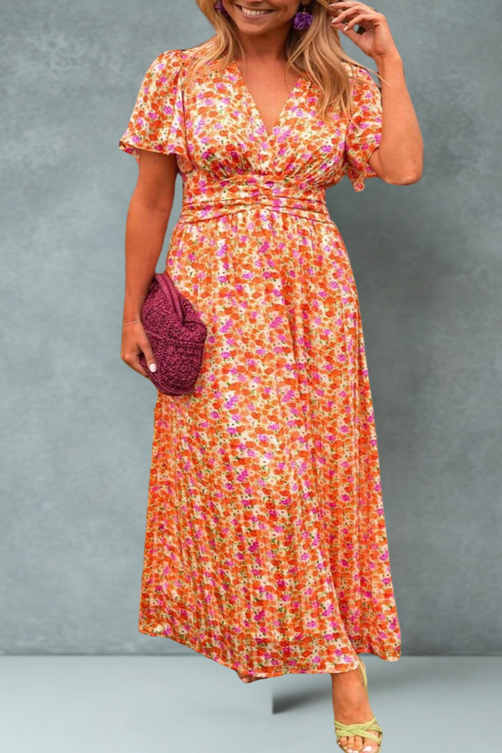 KYNAVA – MAXIKLEID MIT HERZAUSSCHNITT UND BLUMENPRINT