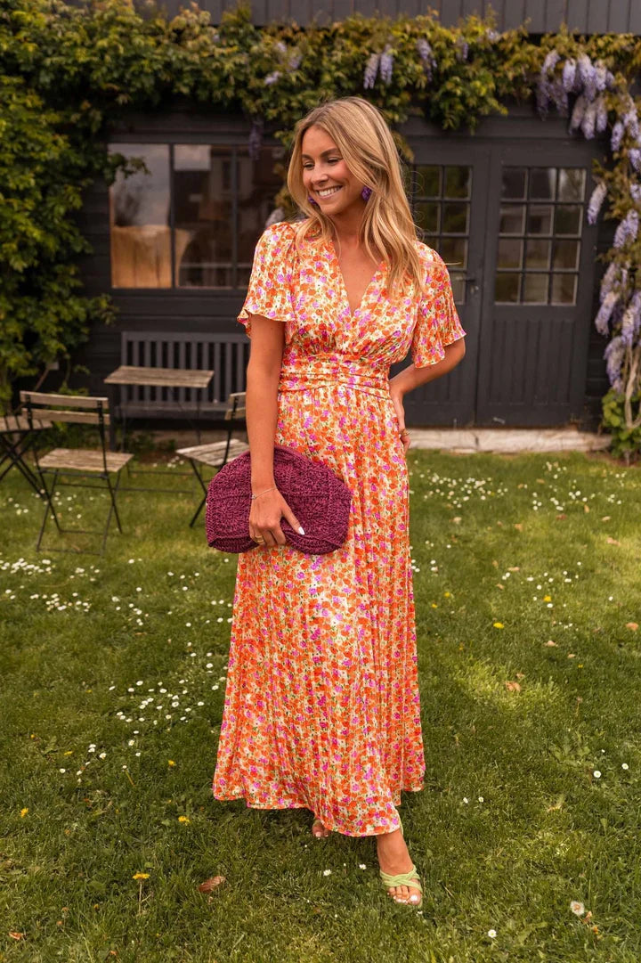 KYNAVA – MAXIKLEID MIT HERZAUSSCHNITT UND BLUMENPRINT